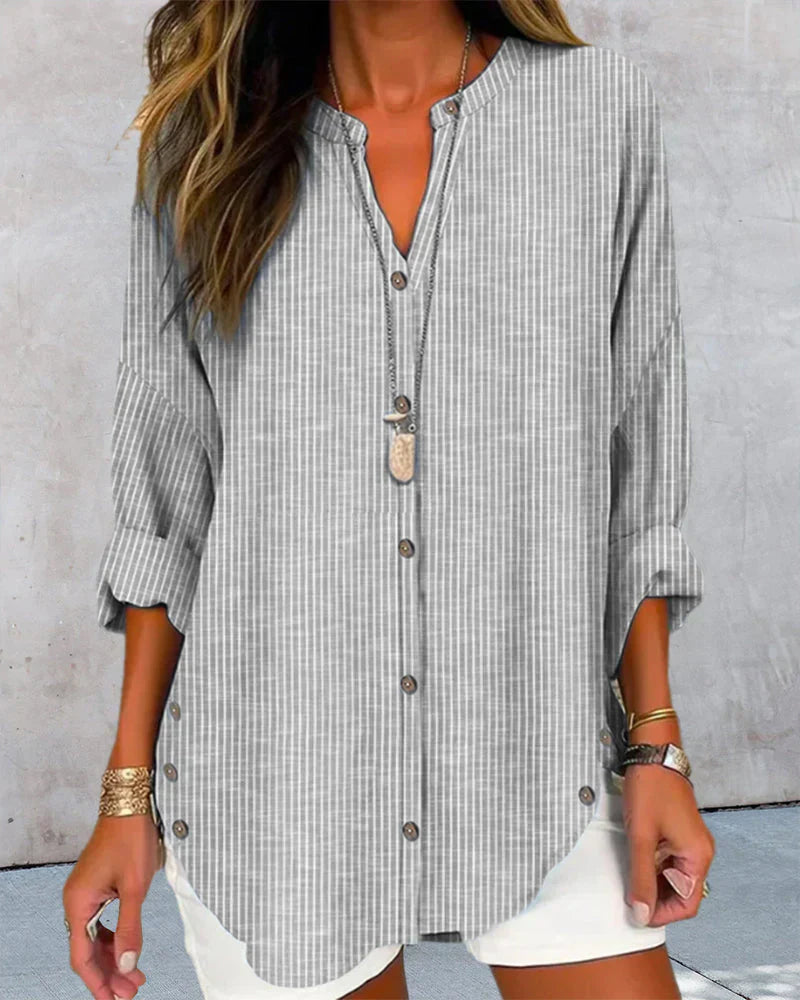 Lucida – Elegantní top s výstřihem do V a nadčasovým pruhovaným vzorem